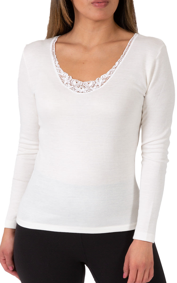 Woman wearing emmebivi cotton long sleeve shirt with lace neckline