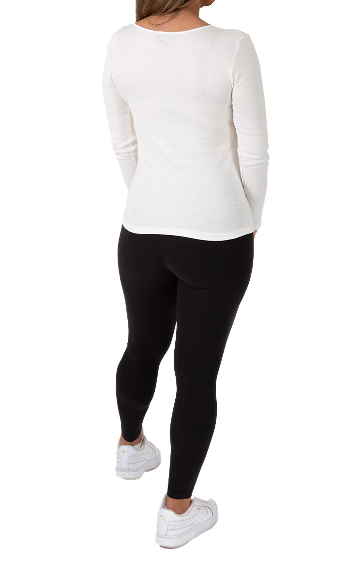 Woman wearing emmebivi cotton long sleeve shirt with lace neckline