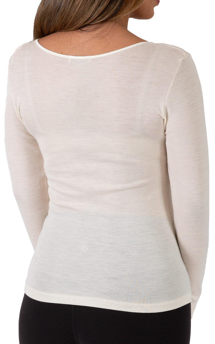 Woman wearing emmebivi cotton long sleeve shirt with lace neckline