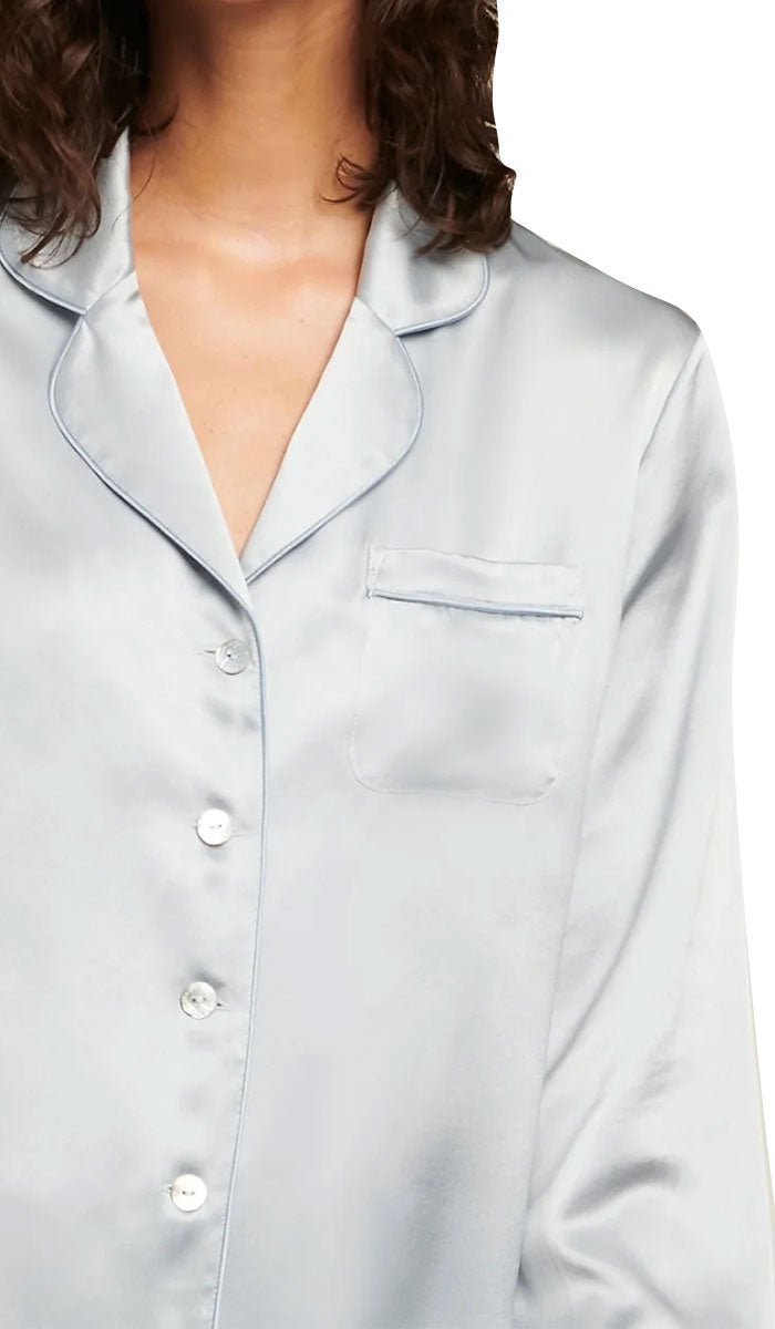 Woman wearing ginia silk pyjama in pearl blue