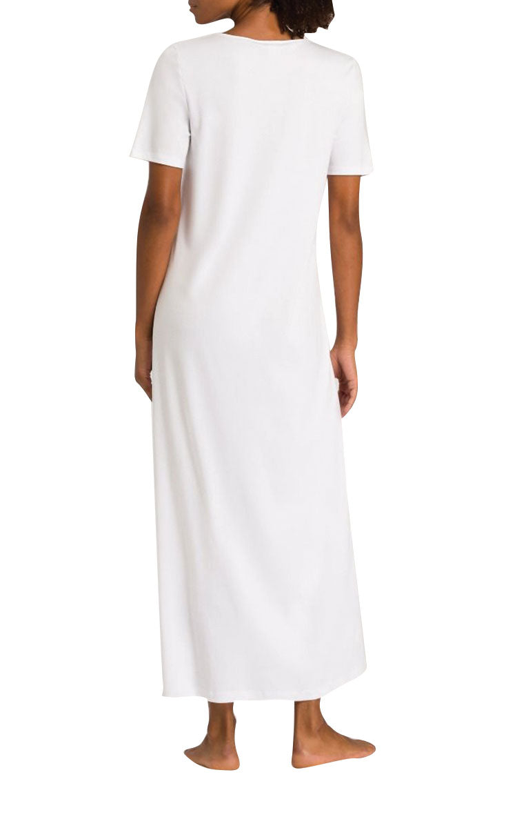 woman wearing hanro cotton nightgown with short sleeve in white