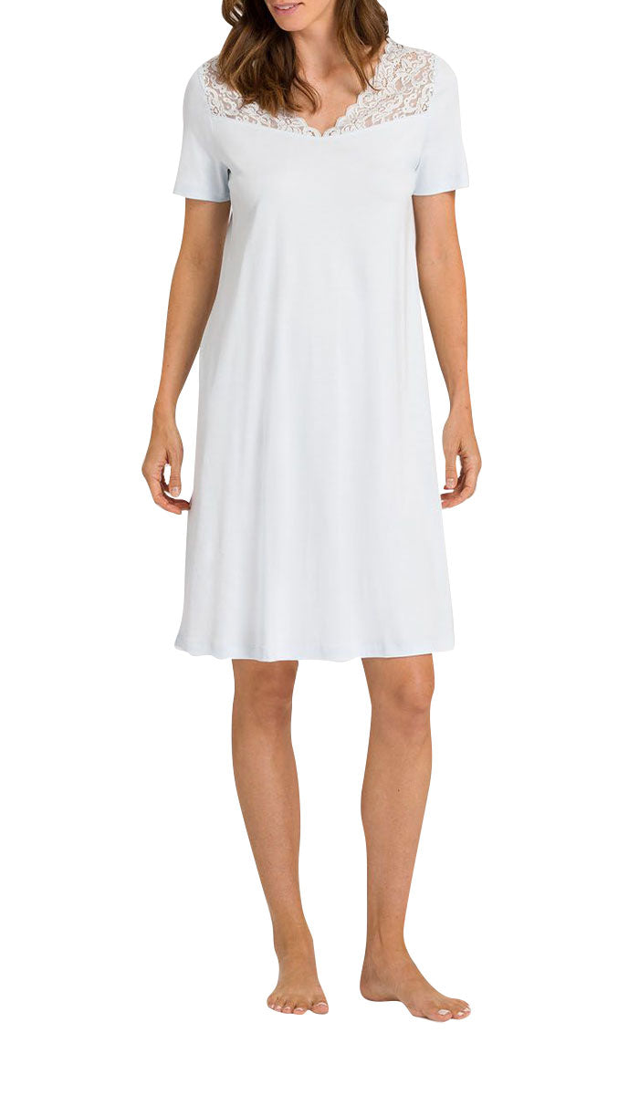 woman wearing hanro summer nightgown in cool blue