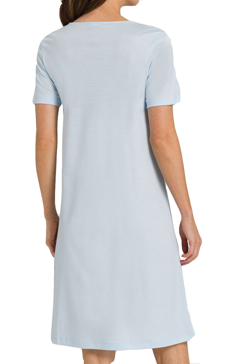 woman wearing hanro summer nightgown in glacier blue