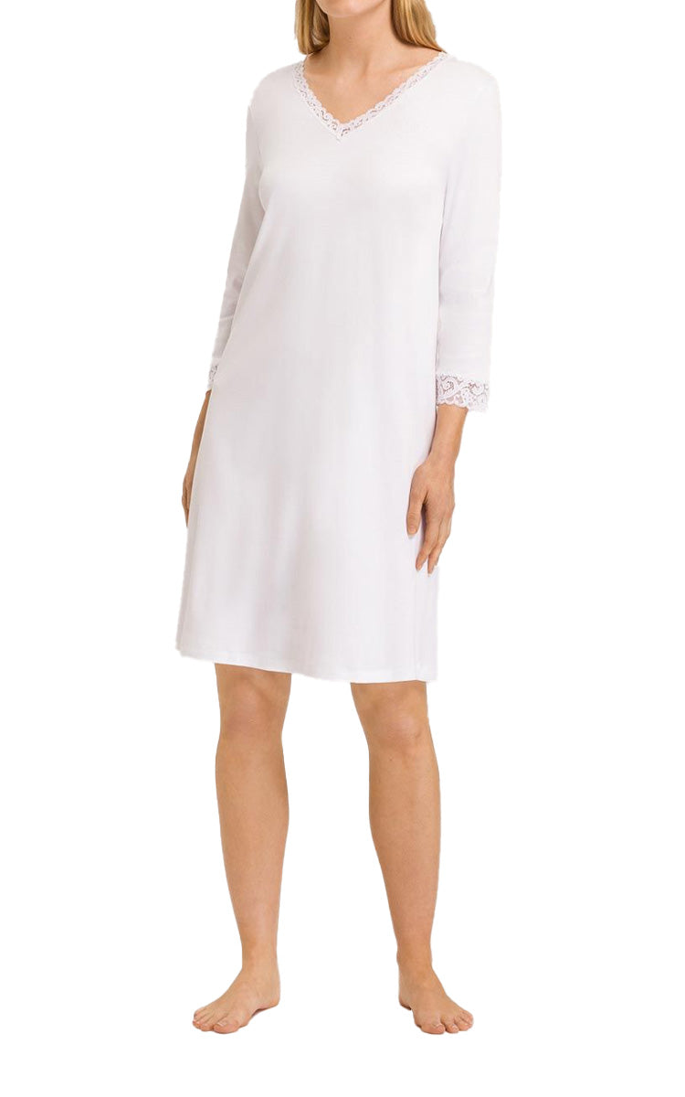 Woman wearing hanro moments 3 quarter sleeve nightie in white