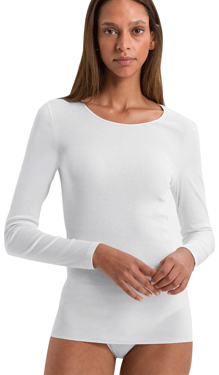 woman wearing Hanro Cotton Long Sleeve shirt in white