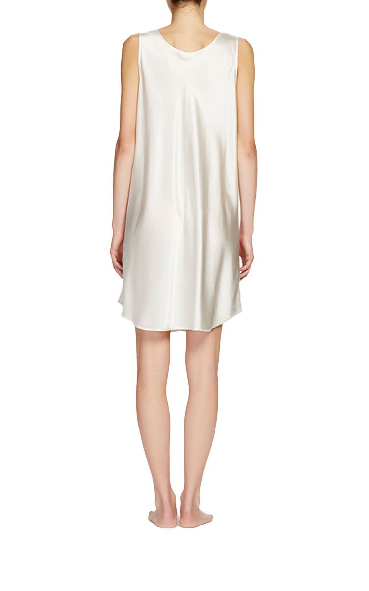 woman wearing ginia silk round neck chemise in ivory