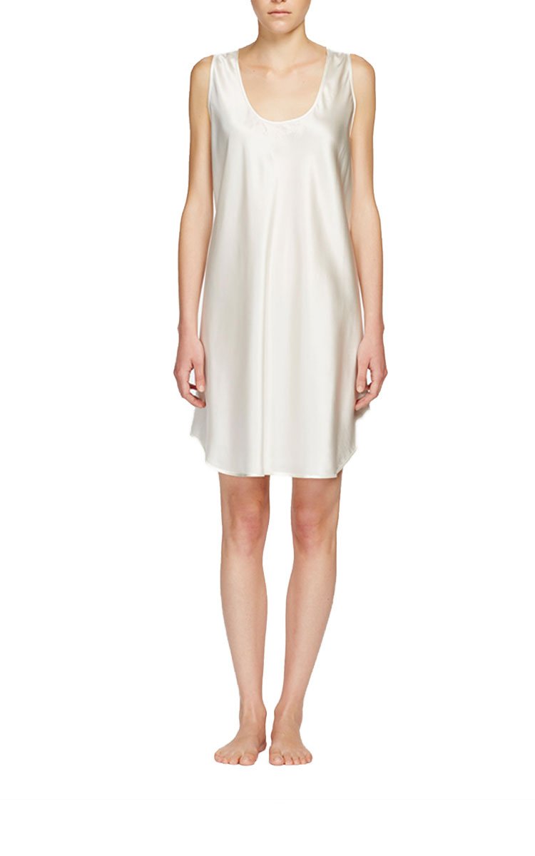woman wearing ginia silk round neck chemise in ivory