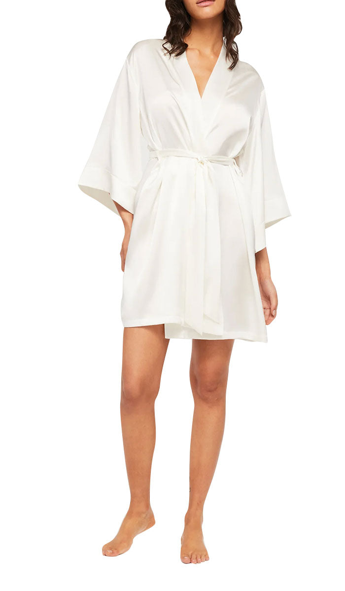 woman wearing ginia silk robe in ivory