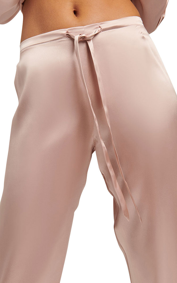 woman wearing Ginia Silk Pyjama In Silver Pink