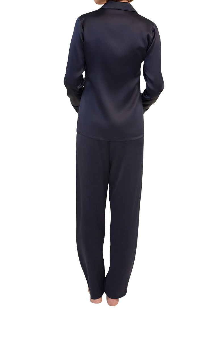 woman wearing Ginia Long Sleeve Silk Pyjama In Evening Blue