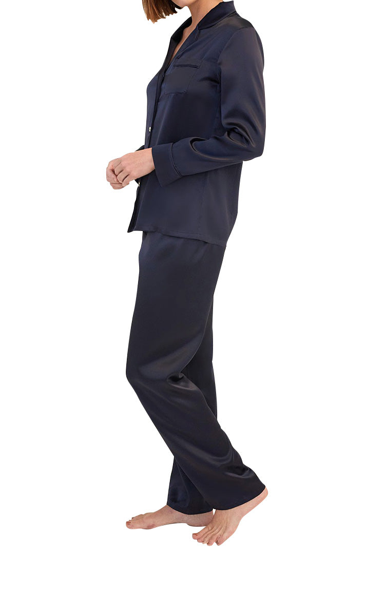 woman wearing Ginia Silk Pyjama In evening blue
