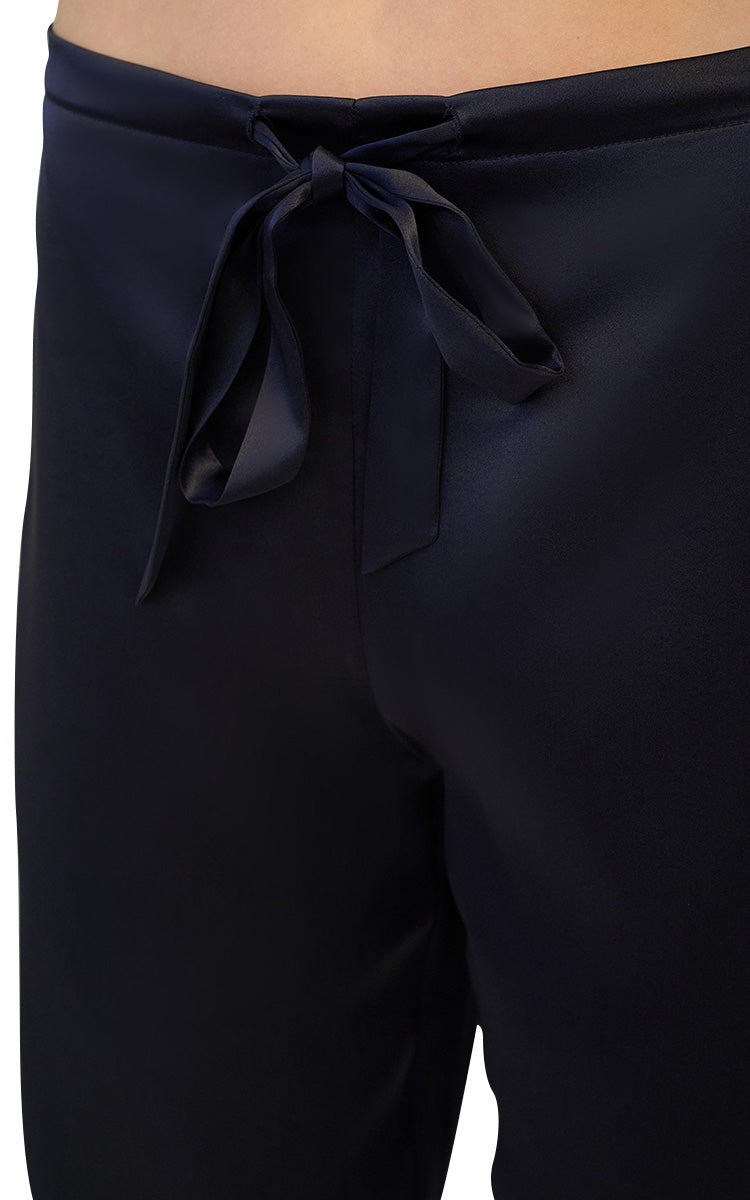 woman wearing Ginia Silk Pyjama In evening blue